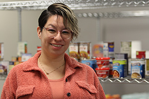 Akilah Childs in food pantry