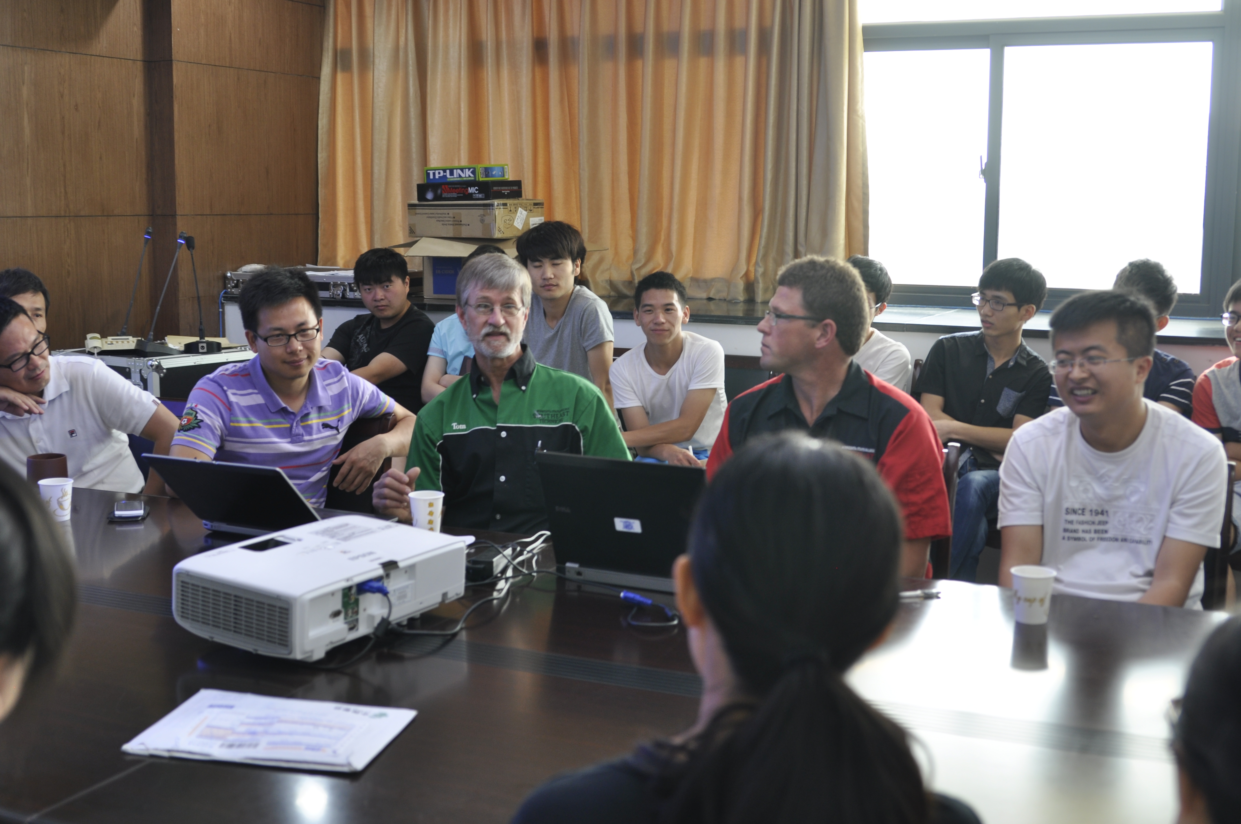 Tom Brandt and Niel Christensen visit classroom in China