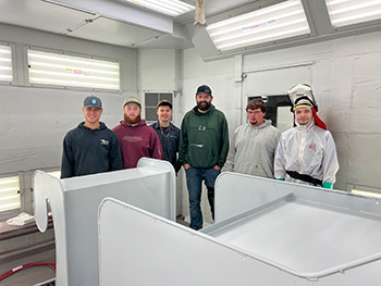 Auto Body students and sleigh