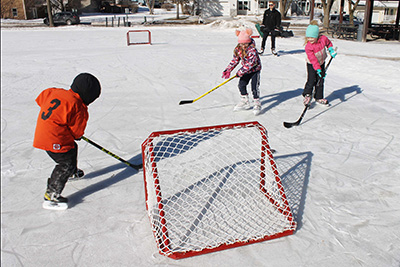 skaters on ice rink