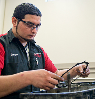 Tech seating a mechanical seal in an engine