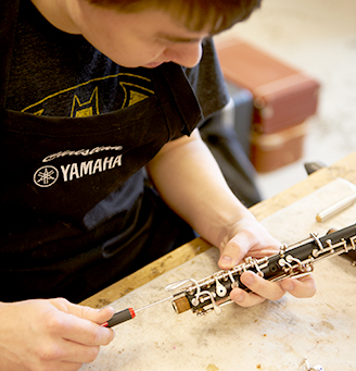 Student working on a clarinet