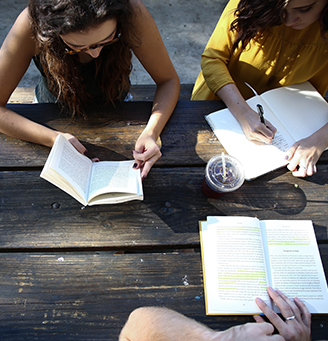 Students at a table, seen from above