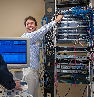 Technician working on server rack