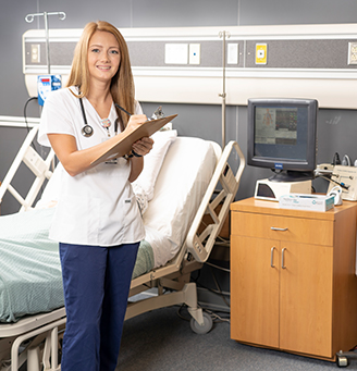 Nursing student in hospital room lab