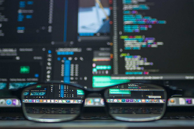 Eyeglasses in front of computers screens