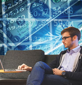 Man on couch with laptop with numbers and money symbols behind him.