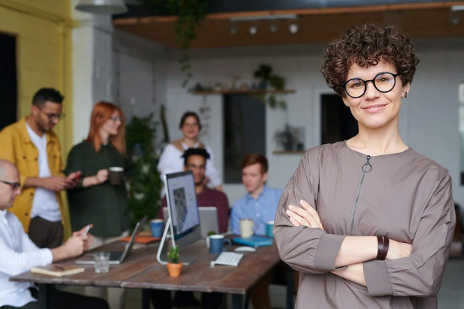 Group of people working with business person in foreground, Photo from Pexels.com